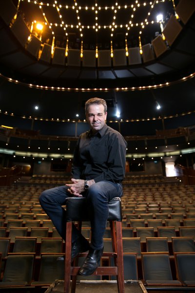 General and Artistic Director of The Atlanta Opera Tomer Zvulun seated onstage.