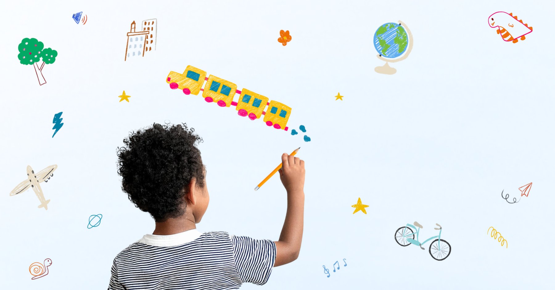 Young boy drawing cartoon illustrations of everyday things from his imagination.