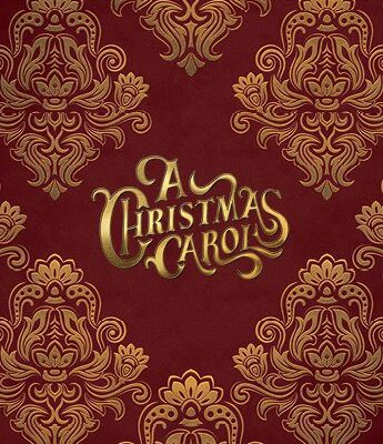A red book cover with gold ornate patterns and the title "A Christmas Carol" in decorative gold lettering at the center.