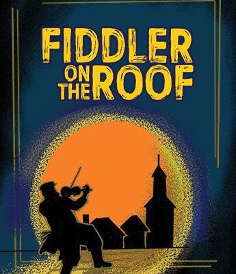A silhouetted violinist stands on a rooftop at sunset with buildings and a church in the background. The text reads "Fiddler on the Roof.