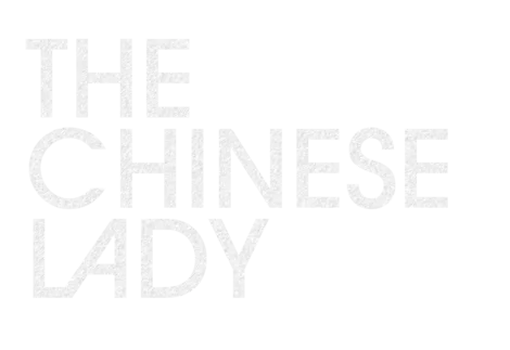 Large, light gray text on a white background reads: “THE CHINESE LADY.”.