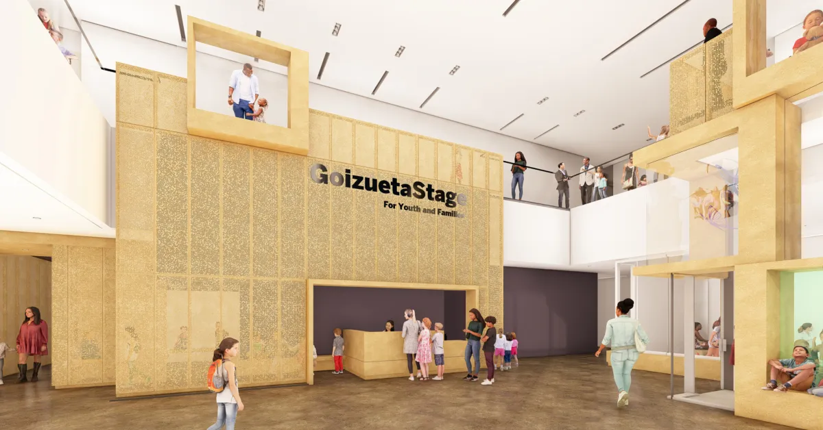 Rendering of a modern theater lobby with people interacting, children and adults present, and a sign reading "Goizueta Stage For Youth and Families" above a reception desk.