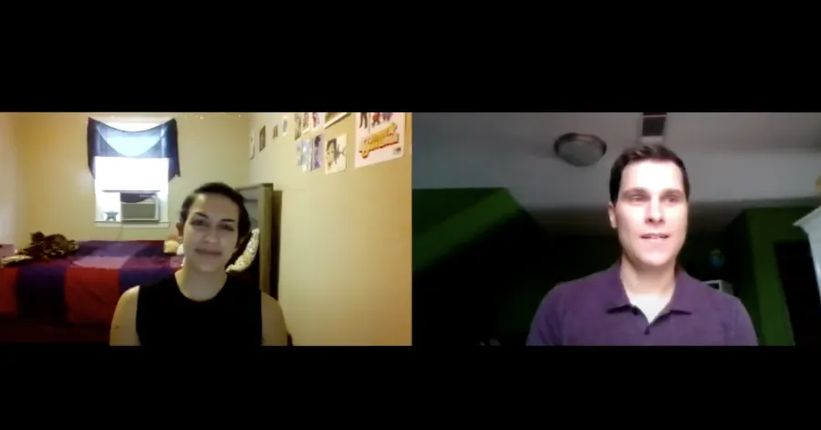 Two people are having a video call; one is sitting in a bedroom, and the other is in a room with green walls and a ceiling light.