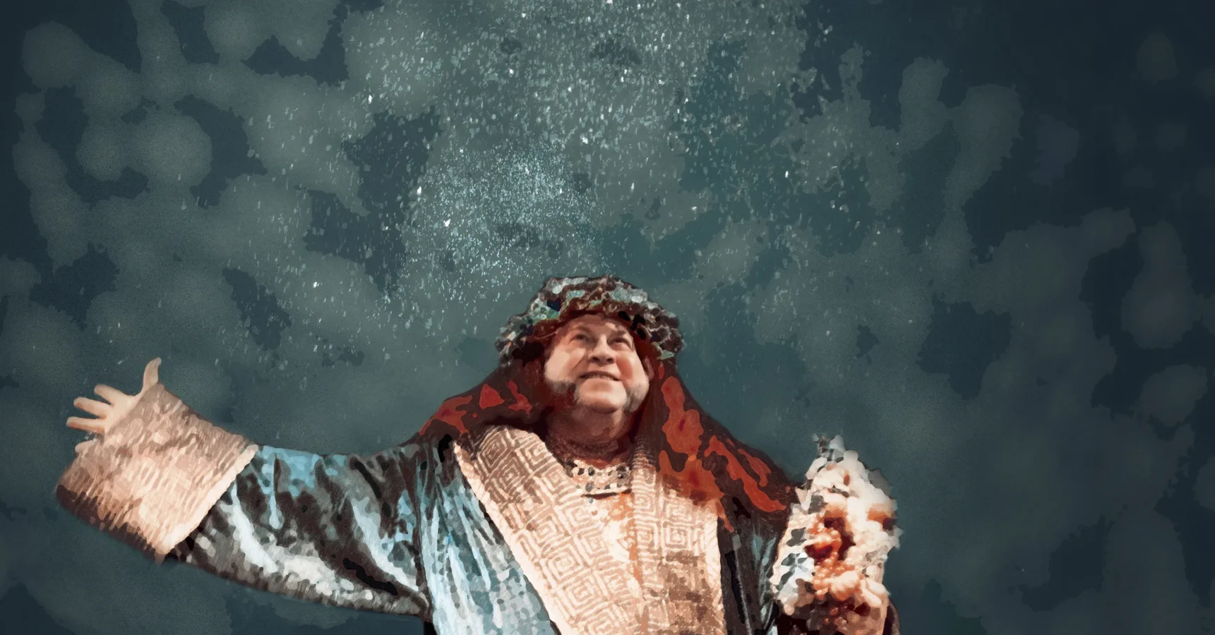 A person in ornate, historical costume stands with one arm raised and holds an object, with light or particles falling around them against a dark background.
