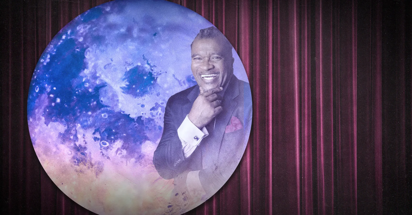 A man in a suit smiles with his hand on his chin, superimposed over a circular image of the moon, with red stage curtains in the background.