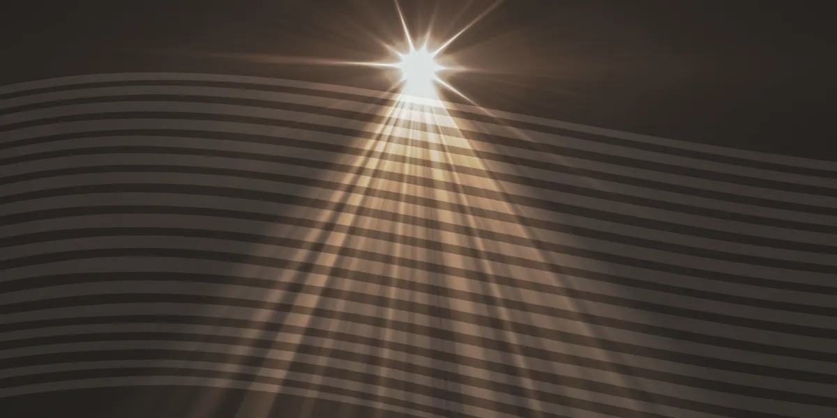 A bright light shines from above, casting wide, angled beams and shadows across a dark background with horizontal, evenly spaced lines.