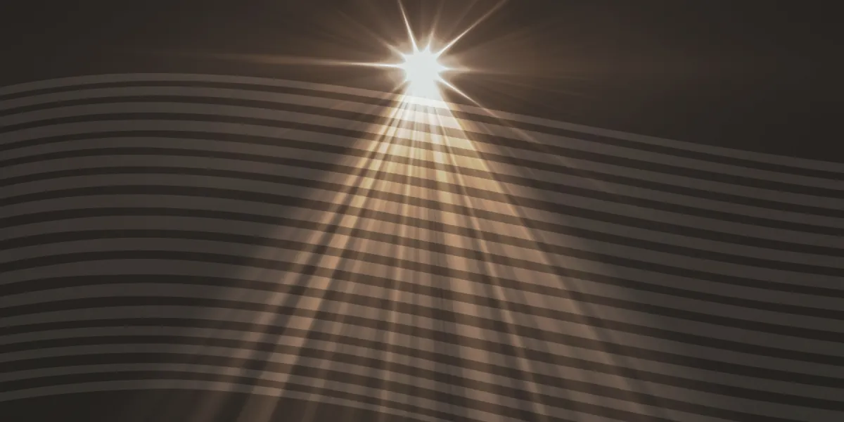 A bright light shines from above, casting beams through horizontal dark and light stripes on a black background.