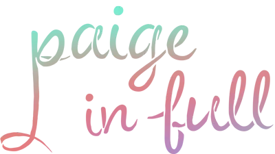 A person sits at a desk with a laptop, holding their head in one hand and looking stressed. Papers, a coffee cup, and office supplies are scattered on the desk.