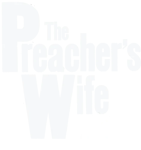 Faint, partially erased text reads "A New Language," with scattered black ink marks on a white background.