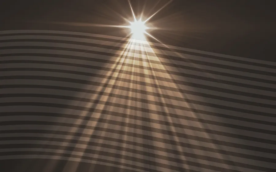 Bright light beams shine down in a dark space, casting striped shadows over a curved surface below.