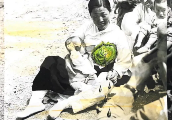 A woman sits on the ground holding a baby with a digitally added cabbage over its body and illustrated water droplets below. Other adults and children are seated nearby.
