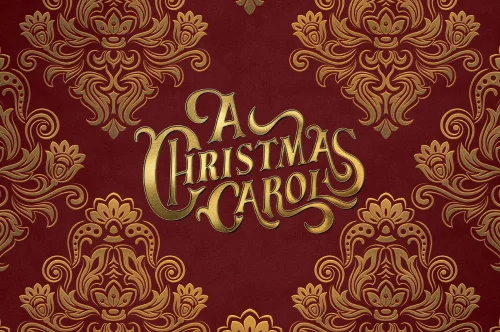 Red background with ornate gold floral patterns and the words "A Christmas Carol" in decorative gold lettering at the center.