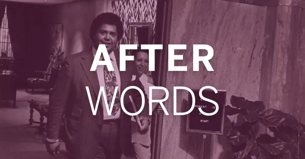 AfterwordsMOVINGhero Two people walk through an interior space with “AFTER WORDS” written in large text across the image. A plant and a sign are visible in the foreground.