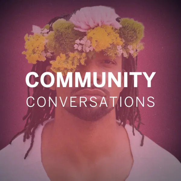 A person with long hair and a flower crown is set against a pink background with the text "Community Conversations" overlaid.