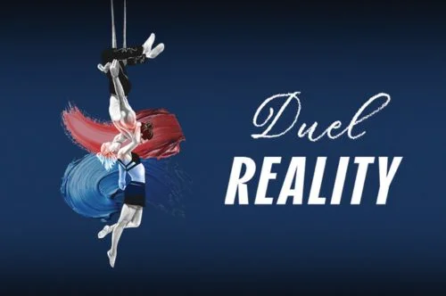 Two acrobats, one with red hair and one with blue hair, perform an aerial act against a dark blue background with the text "Duel Reality" displayed.