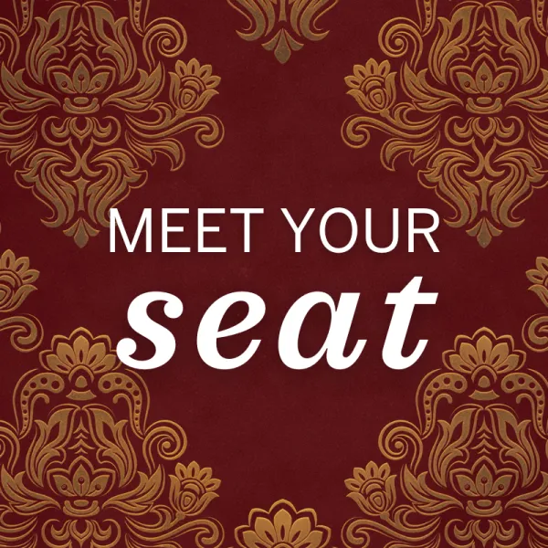 Maroon background with ornate gold floral patterns and the words "MEET YOUR seat" in white, with "seat" in italic font at the center.