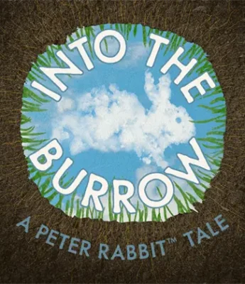 A circular patch of sky shaped like a rabbit is surrounded by green grass and soil, with the text “INTO THE BURROW” and “A PETER RABBIT TALE” written on it.