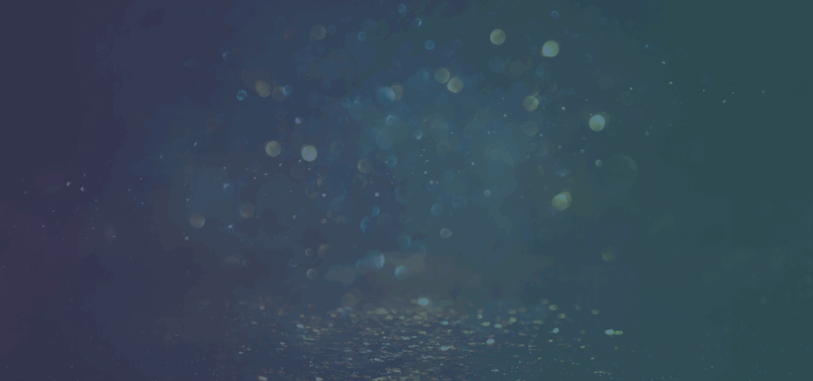 Blue and green gradient background with bokeh light effects and soft, out-of-focus circular highlights scattered throughout the image.