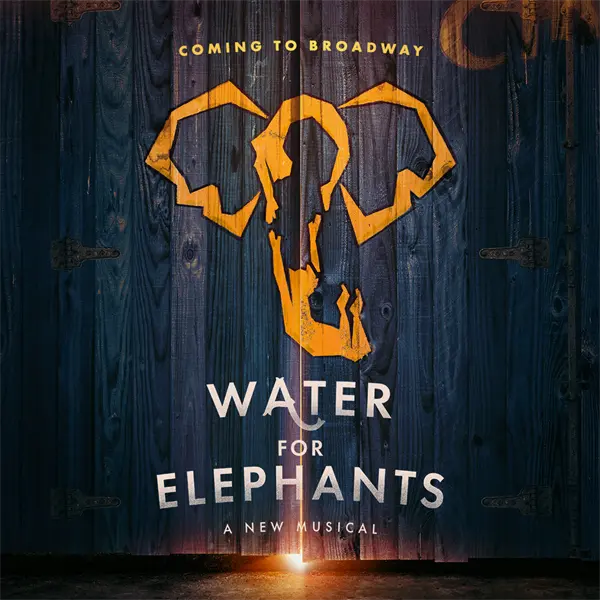 Poster for "Water for Elephants: A New Musical," featuring an orange elephant head graphic on dark wooden boards with light shining through a crack. Text reads "Coming to Broadway.