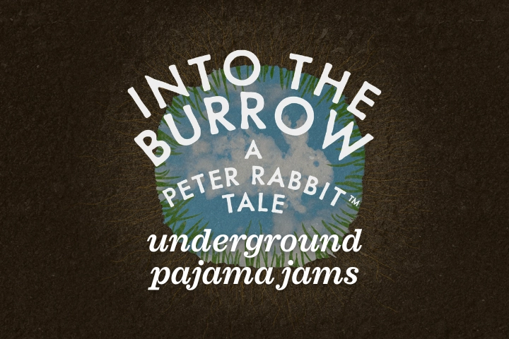 Logo for "Into the Burrow: A Peter Rabbit Tale Underground Pajama Jams" with text over an illustrated burrow and grass.