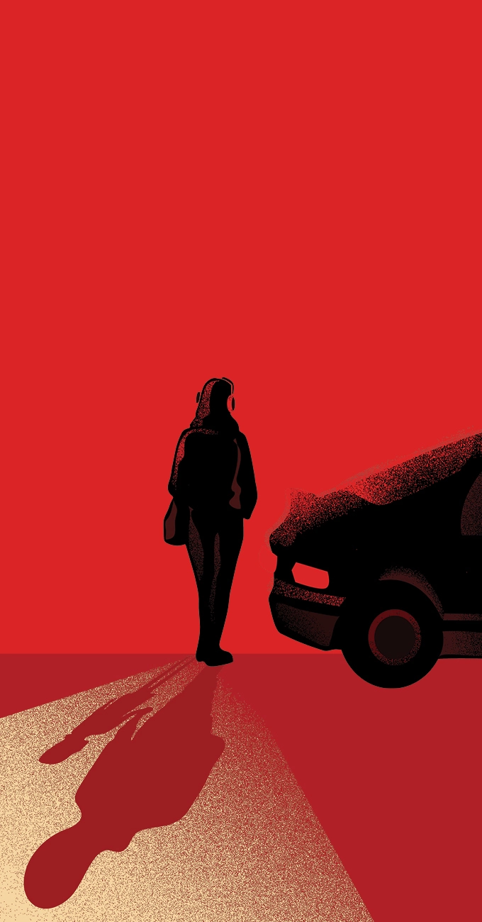 A person wearing headphones stands facing a parked car, casting a long shadow on the ground, with a red background—a quiet moment that suggests a story of connection and reflection, almost as if it’s titled Like Father.