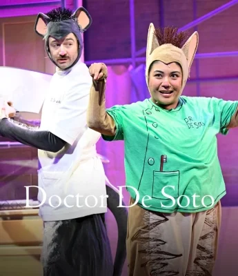 Two actors in animal costumes perform on stage; one wears a gray mouse suit and the other a tan and green outfit labeled "Dr. De Soto," with the text "Doctor De Soto" and a playful Dinosaur Stream backdrop over the image.